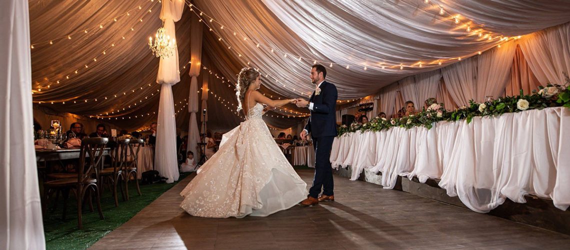 Dark maple dance floor at a wedding